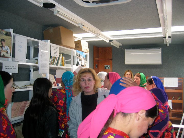 Image of girls looking at donated books